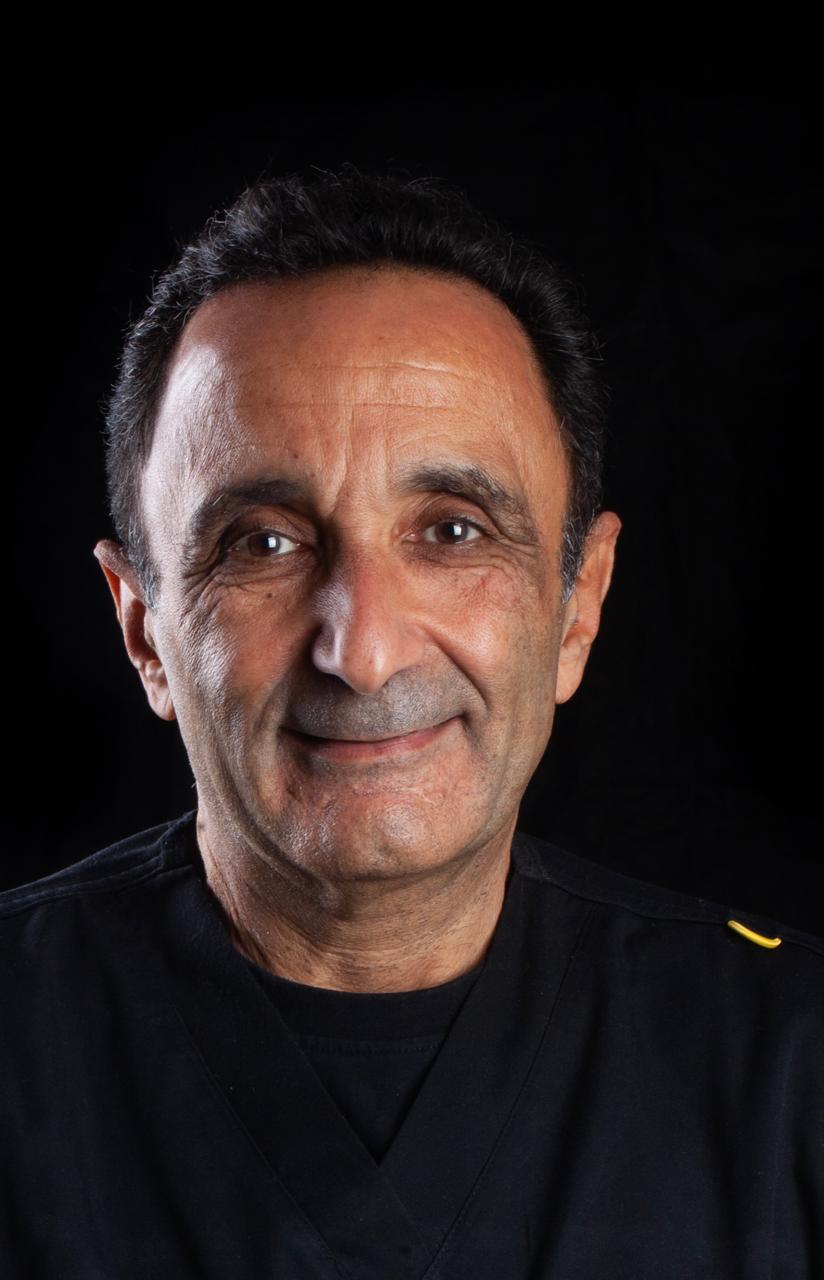 Dr. Mohamed Abdallah - Cosmetic & Implant Dentistry at Beyond Smiles Dental Clinic
